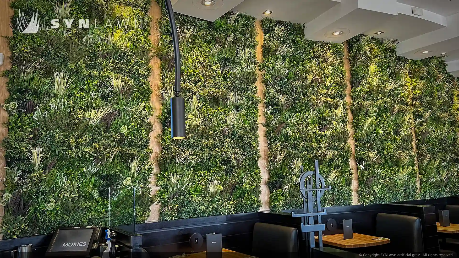 image of Calico Greens Tuscany Faux Wall Panels at Moxies Casual Dining Restaurant in Toronto Canada