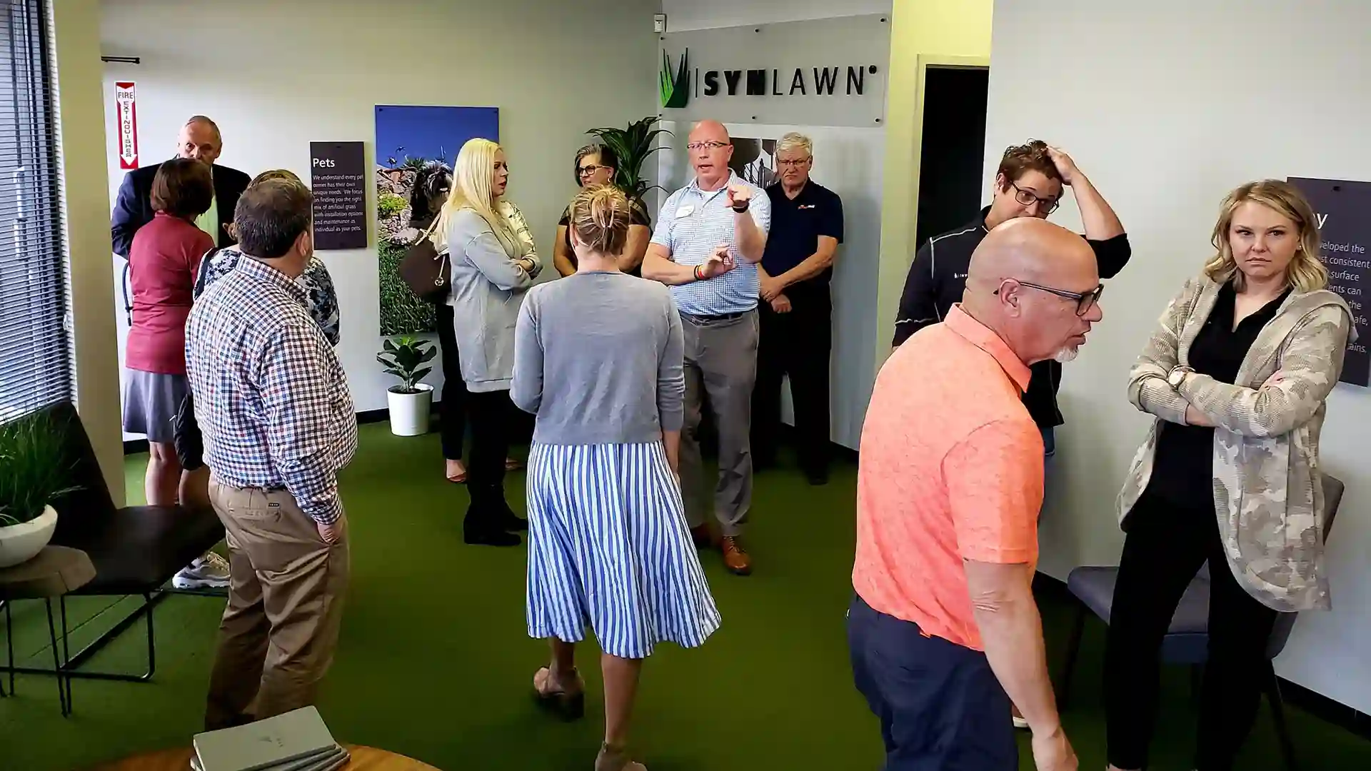 image of the grand opening ribbon cutting of the synlawn saint louis showroom