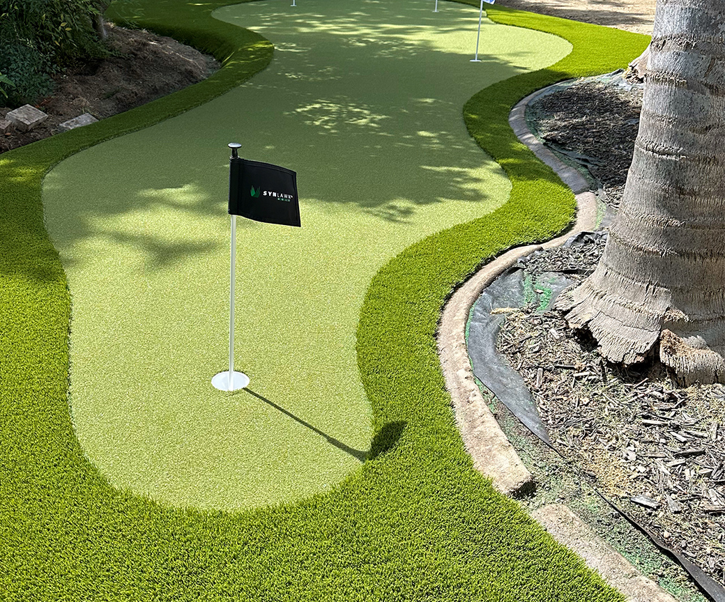 Golf putting green with tree